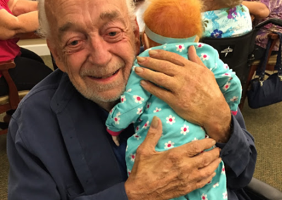 old man with doll